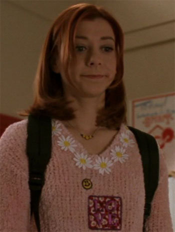 Willow in a fuzzy pink sweater